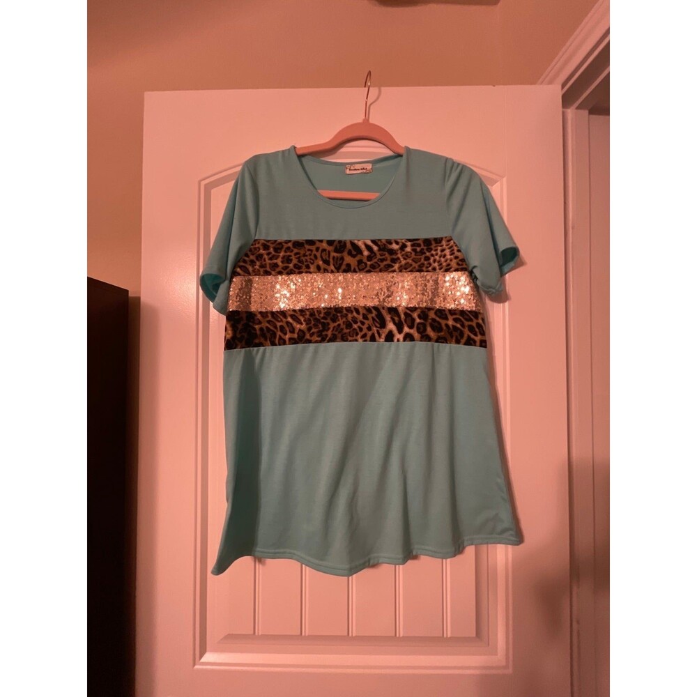 Southern stitch turquoise top with gold sequins and leopard size small